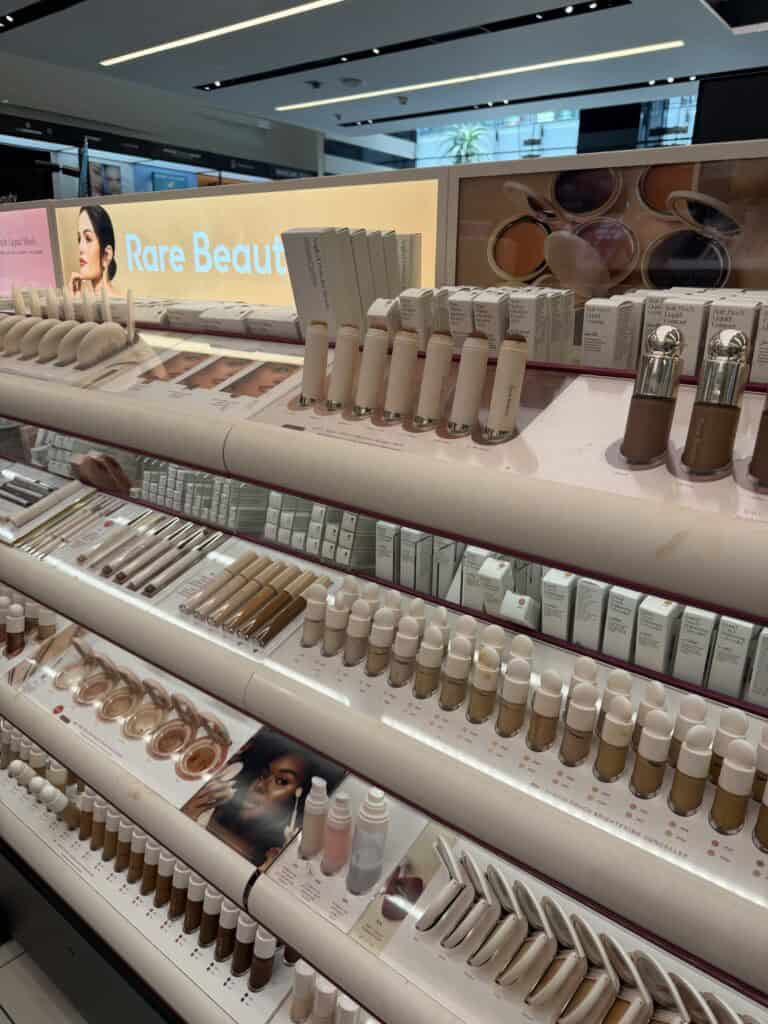 Rare Beauty display at Sephora showing the Warm Wishes Effortless Bronzer Stick lineup