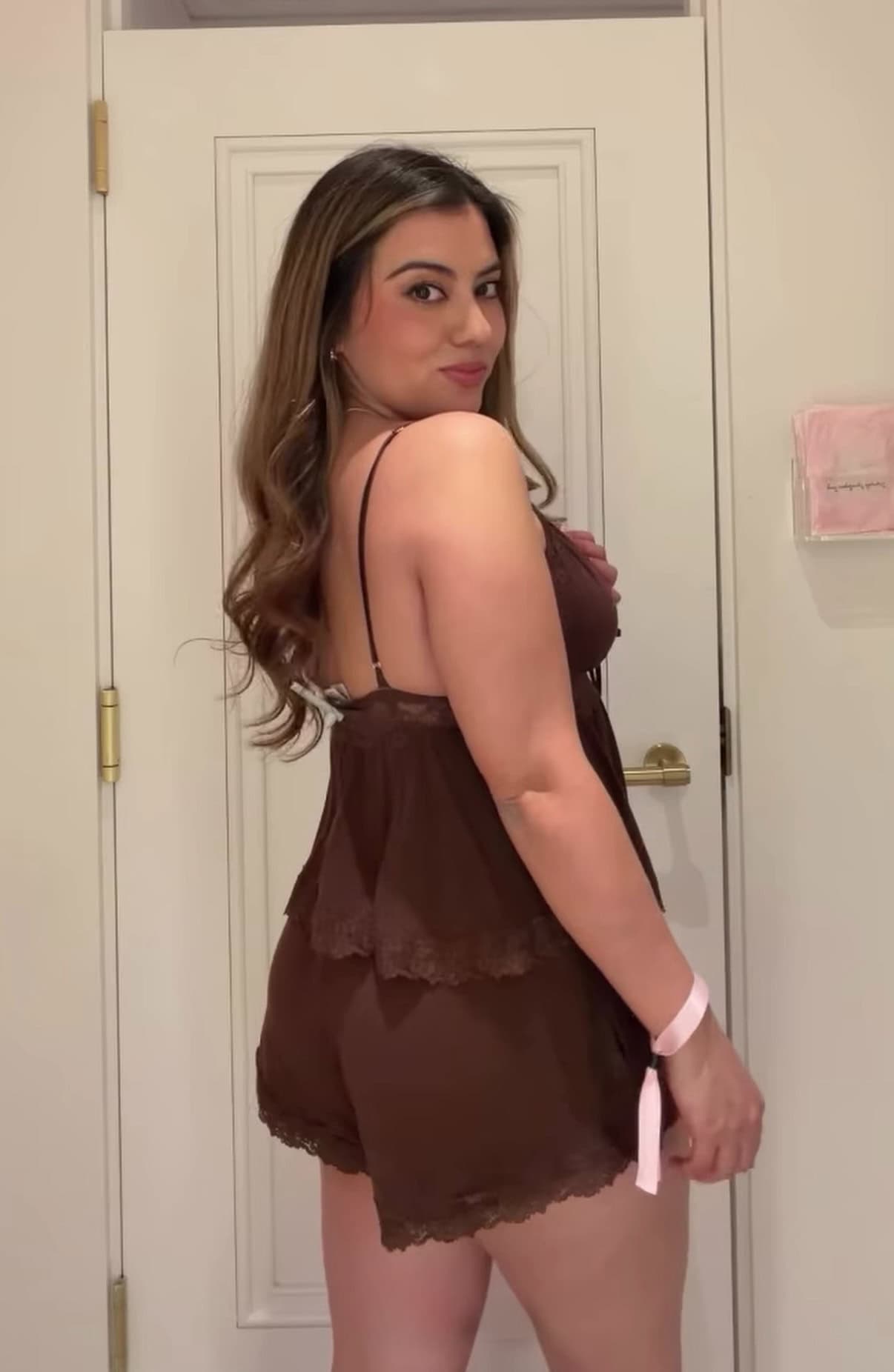 Jasmine Del Toro wearing a Victoria's Secret chocolate brown lace cami and shorts pajama set – honest review from a VS brand ambassador