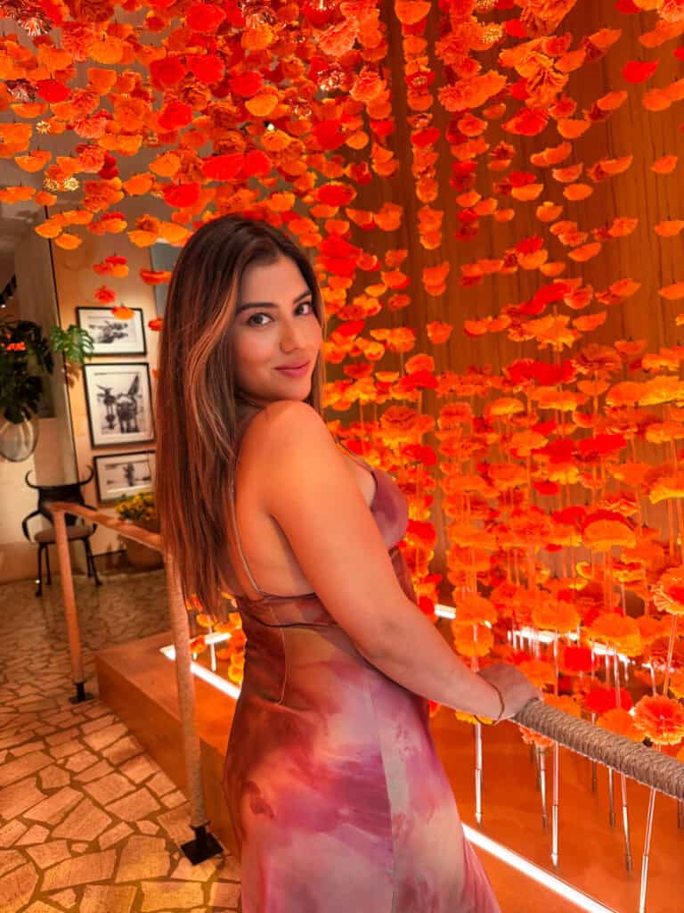 Jasmine wearing a 12th tribe dress for wedding guest idea outfits