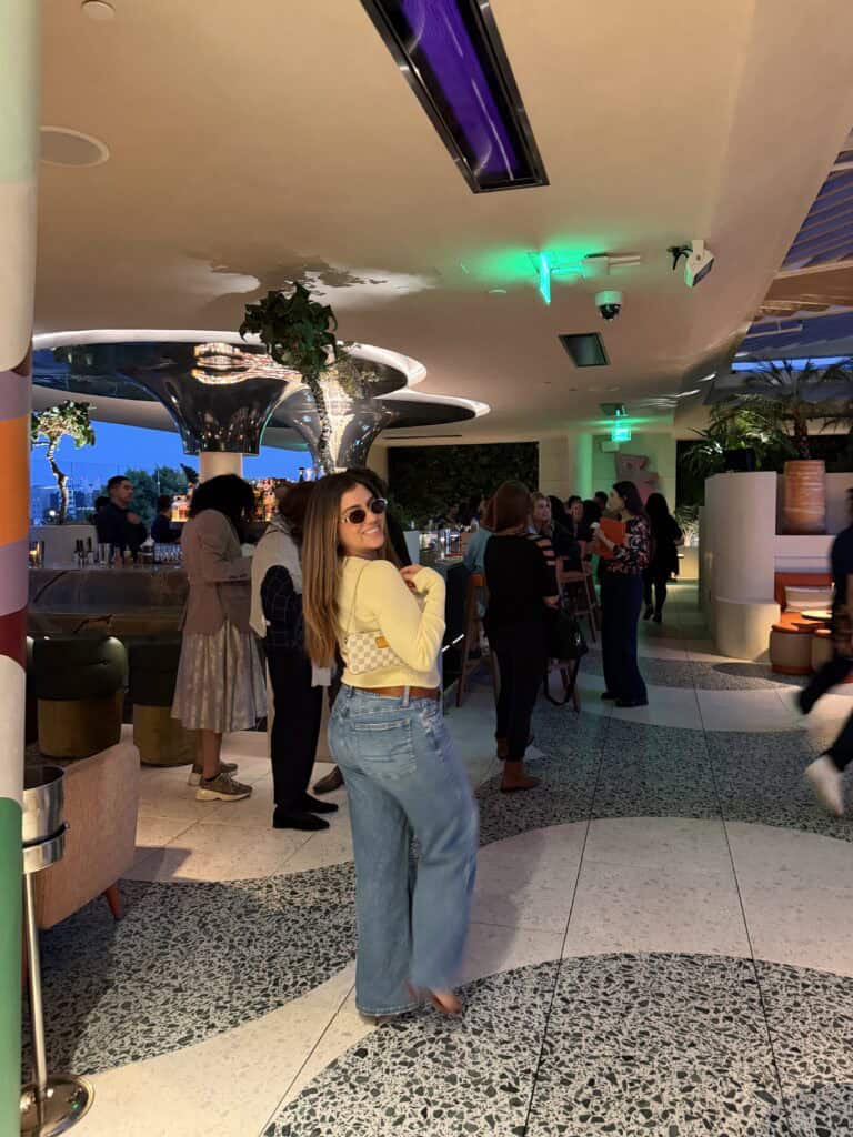 layers of beauty founder walking confidently through a crowd in Los Angeles representing what is confidence and how to build it