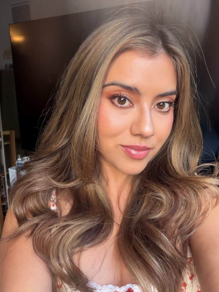 layers of beauty founder showing how to do cold girl makeup