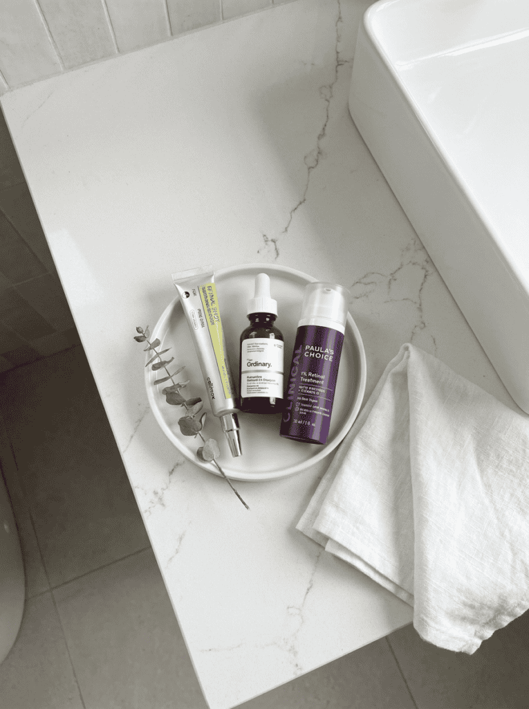 Retinol, Retinal, & Retinoid on a bathroom counter