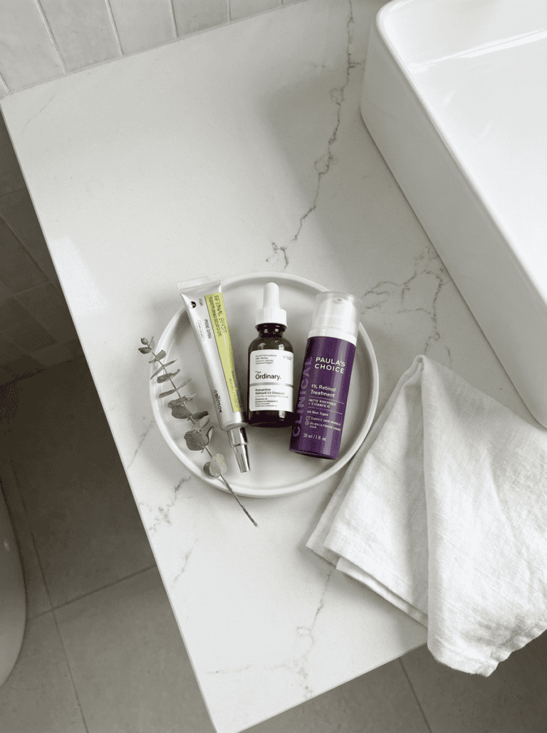 Retinol, Retinal, & Retinoid on a bathroom counter