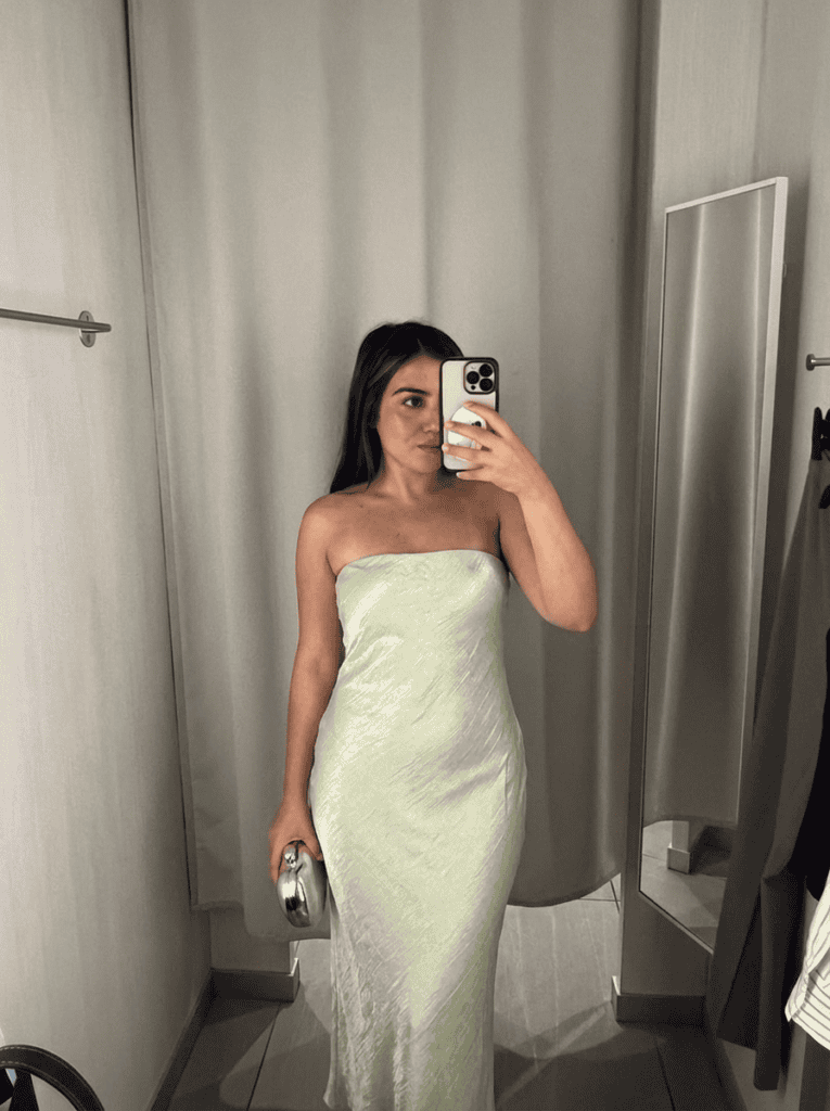 layers of beauty founder wearing a cocktail dress for blog