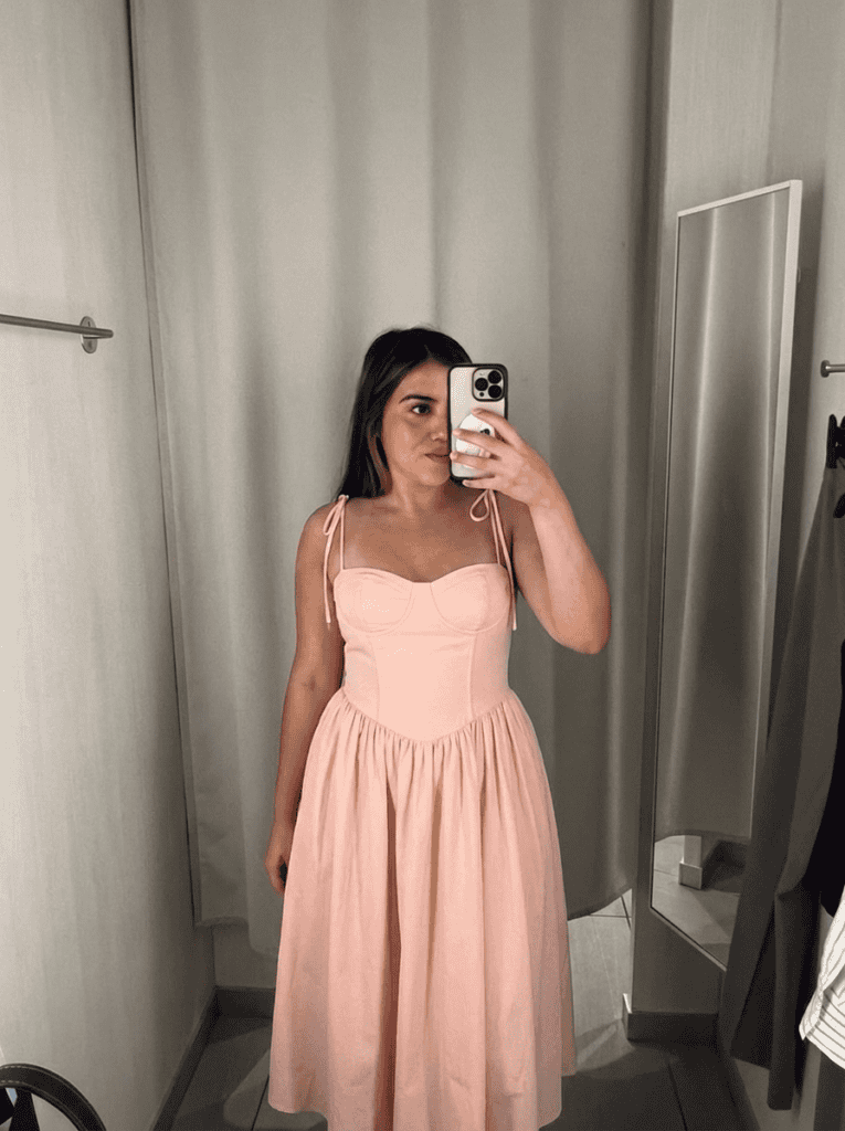 jasmine, layers of beauty founder, wearing a sundress