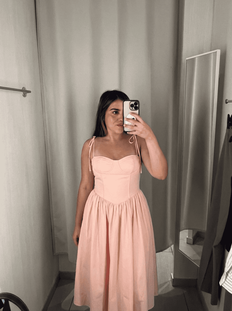 jasmine, layers of beauty founder, wearing a sundress