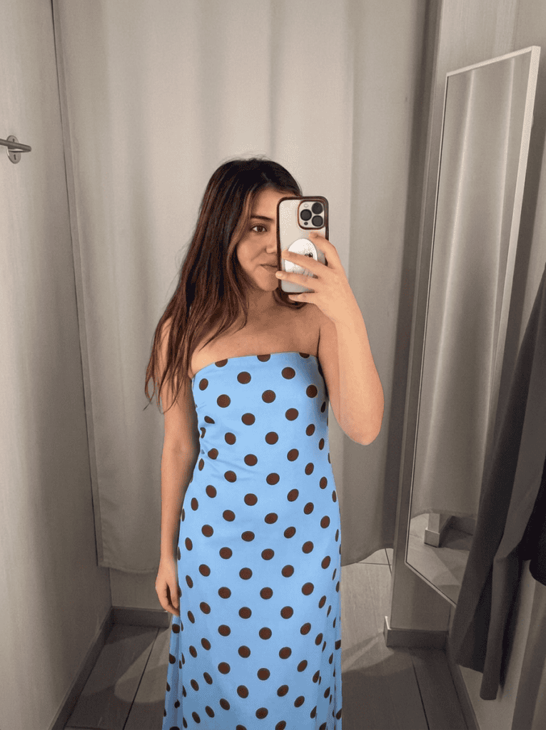 jasmine wearing a blue meshki dress